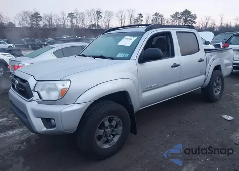 2012 Toyota Tacoma Base V6 z USA, uszkodzony, nr VIN 3TMLU4EN3CM089870